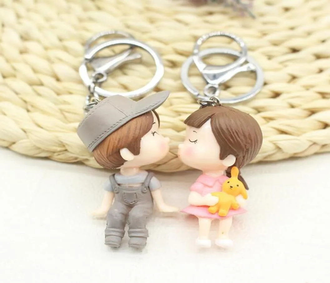 1 par pojke flickor tecknad dockor nyckelchain nyckelring för älskare par söta bilnyckel chian ringhållare kvinnors väska charm pendant9706065