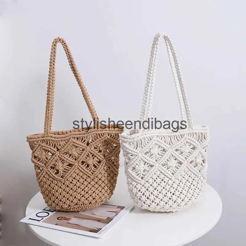 Sacs à bandoulière Littérature et art coton sac tissé à bandoulière unique pour les femmes nouveau style Xia Xiaozhong sac tissé en paille creux à la main pour les femmesH24218