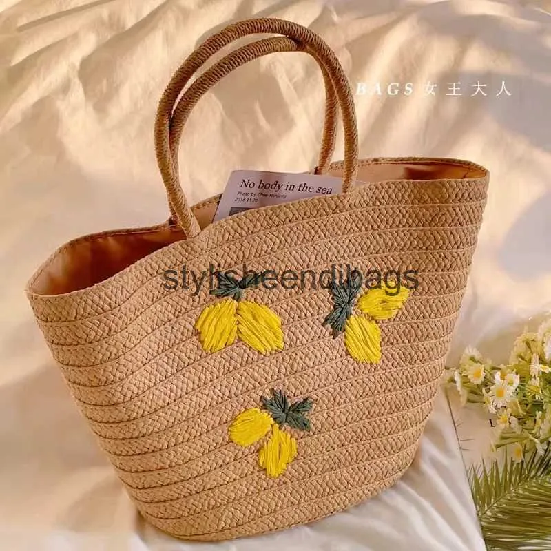 Sacs à bandoulière Broderie faite à la main Thaïlande Grande capacité Sac à main en paille tissé Été Vintage Citron Sac à bandoulière à main H24219