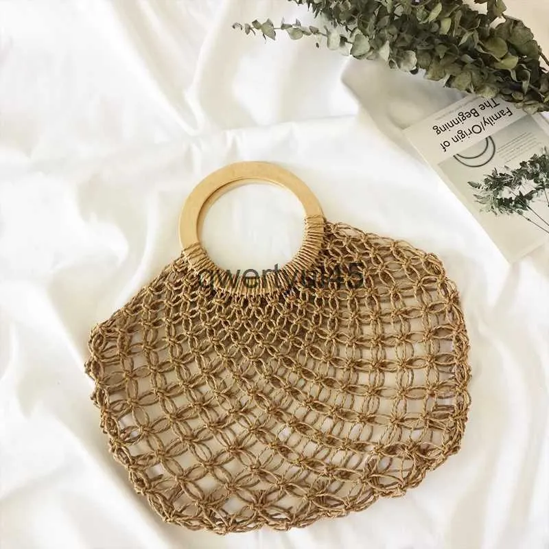 Totes Women andbag Summer andmade Beac Mes Bag Boemia Straw Bags Wooden Round andle Kniing Net ollow Woven Vacation ToteH24218