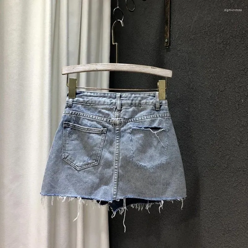 Jupes Mode Été Mince Trou Déchiré Irrégulier Denim Femmes Mince Gland Décontracté Wrap Mini Doux Taille Haute A-ligne Jupe