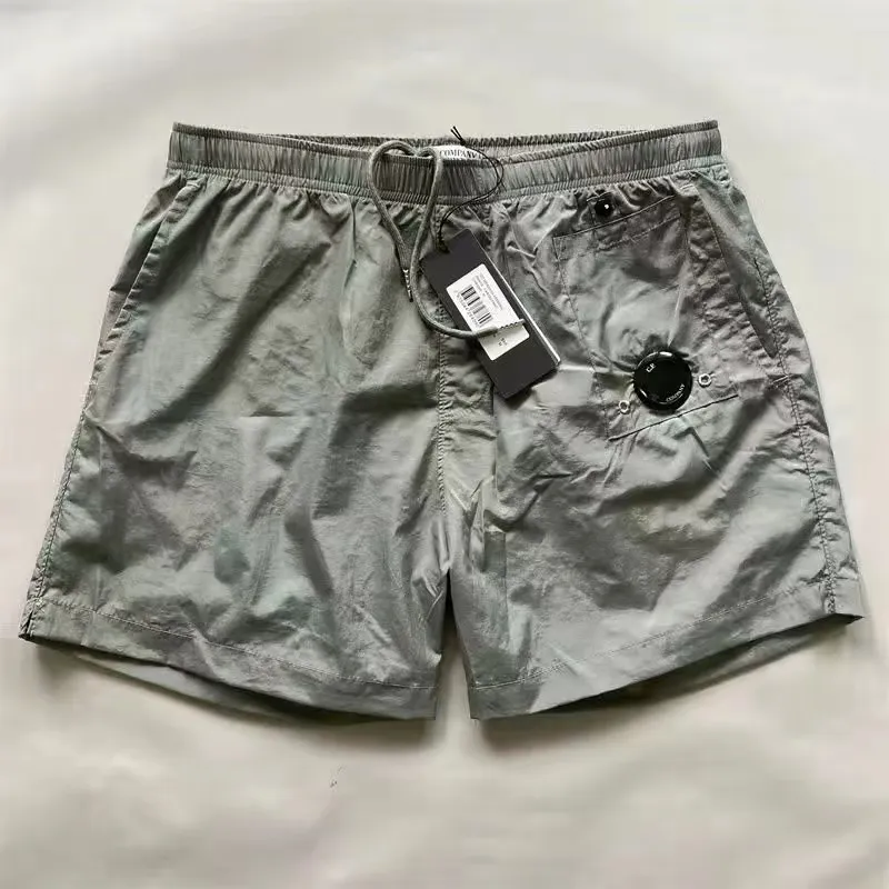 شورتات CP Swim Swims Spring Autumn Strendy Mens Shorts Embroidery Mensed Mens Casual Loose Hight Street Street Black Sports Shorts Quick Drying Man Beach Pants MXDV