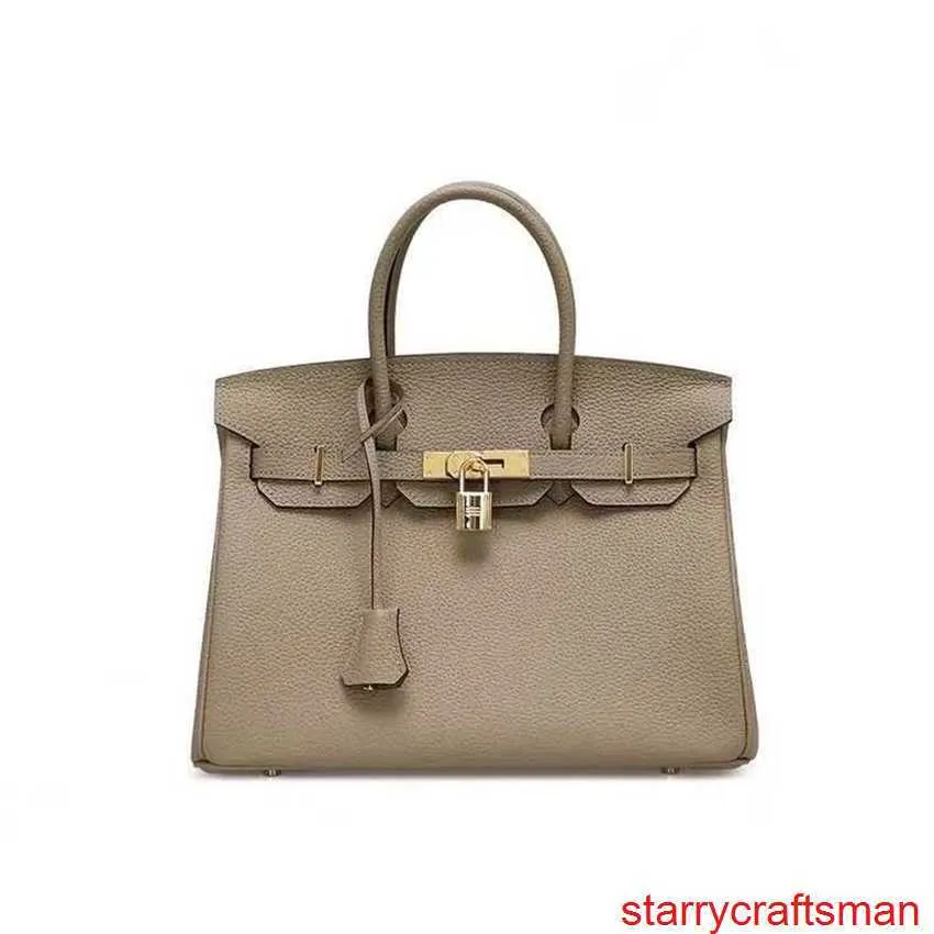 Äkta läderväskor Trusted Luxury Handbag 2024 European Vintage New Women's Bag Handbag Oblique Straddle Bag Utsökt Platinum Bag Hbk30 med logotyp HBTY