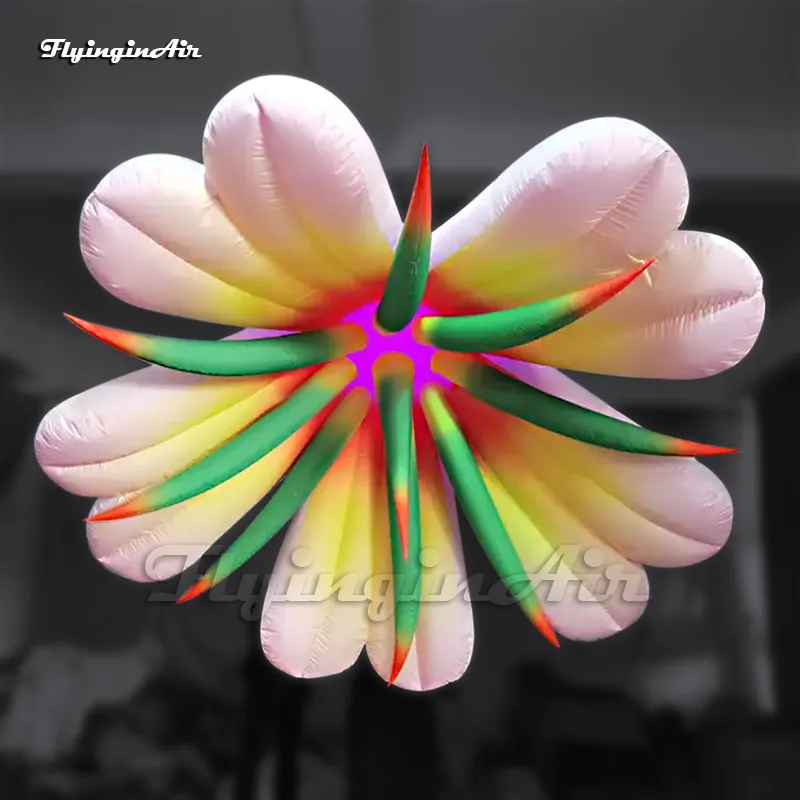 Bellissimi fiori da festa che appendono un grande palloncino gonfiabile illuminato con fiori di giglio con luce a LED per la decorazione di eventi