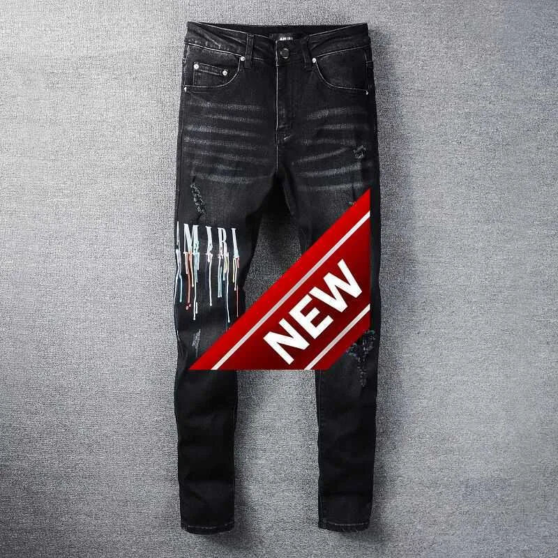 Mens Korean version high street fashion young men black letter paint dot micro large jeans mens trousers