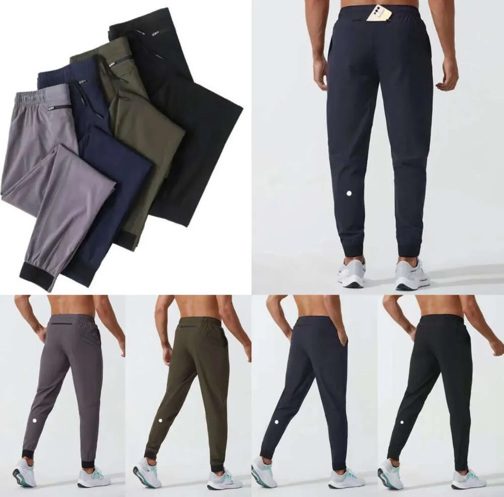 LU WOMENS LL MENS JOGGER LONG PANTS SPORT YOGA OUTFIT Snabbt torrt dragkammar Gymfickor Sweatpants Byxor Casual Elastic Midje Fitness High Quality45345