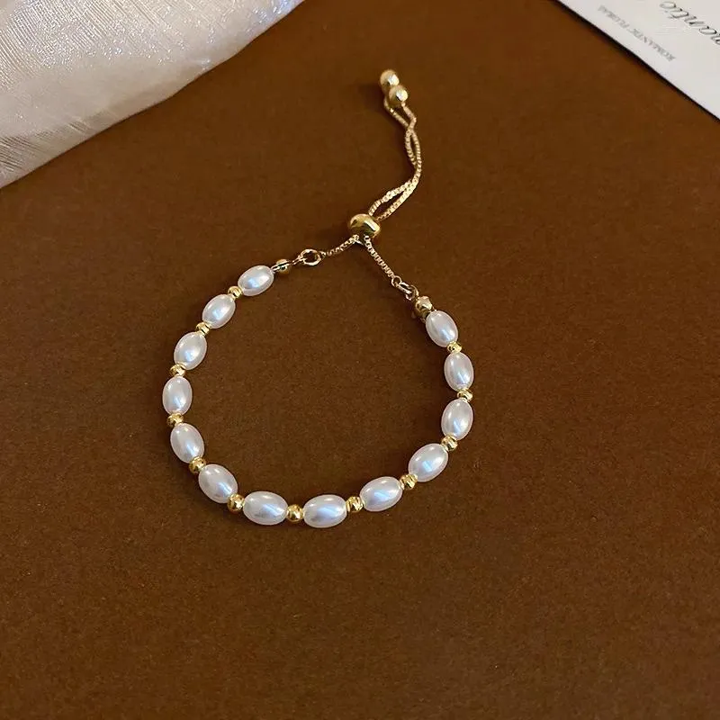 Strand koreansk pärla rund pärla justerbar armband mode enkelt temperament eleganta damsmycken