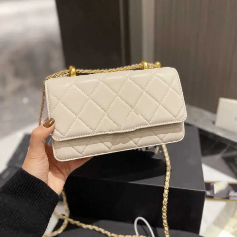 Xiangjia 2022 new leisure woc sheepskin fortune bag small gold ball leather diamond chain bag small square bag women's293Q