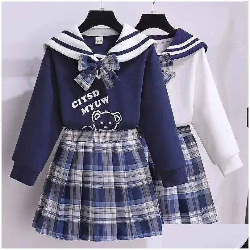 Set di abbigliamento Autunno Junior Girls Jk Uniform Suit Bambini Cute Cartoon Felpa Gonna a pieghe Primavera Scuola 315Y 240106 Drop Deli Dhojc