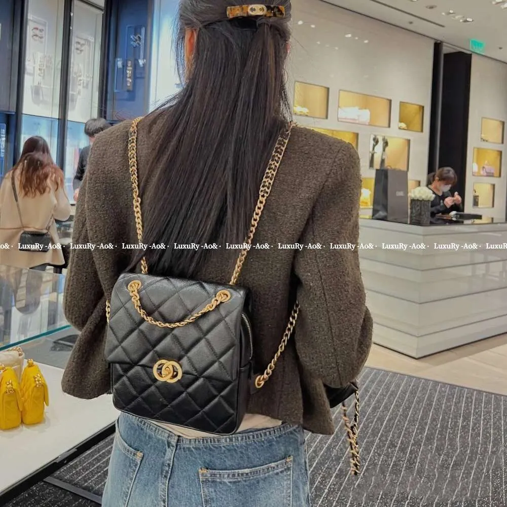 Mochila Xiaoxiangjia 22P, bolsa quadrada pequena, caviar, couro genuíno, corrente de ombro único com grade de diamante, bolsa feminina clássica portátil 75% vendas diretas da fábrica