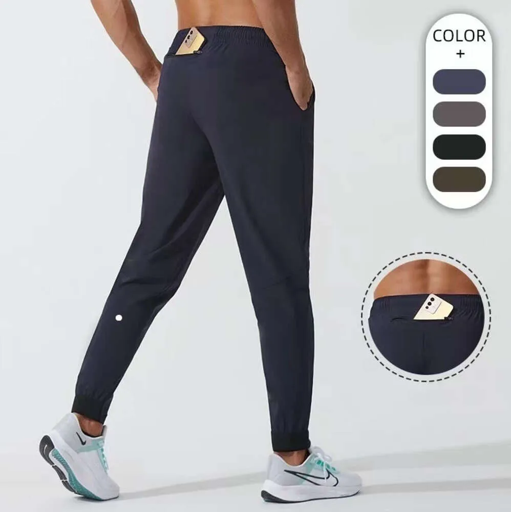 LU Pantalons de yoga hommes femmes LL Jogger Longue tenue de sport Séchage rapide Cordon de serrage Poches de sport Pantalons de survêtement Pantalons décontractés Taille élastique Fitness