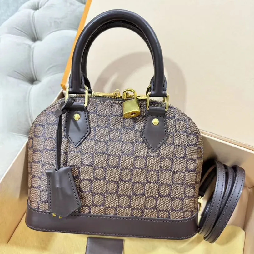 10a Shell Tote Handväska handväska Luxurys designer väska man äkta läder präglad pochette axelkoppling väskor kvinnor mens reser crossbody utgör även topphandtag väska
