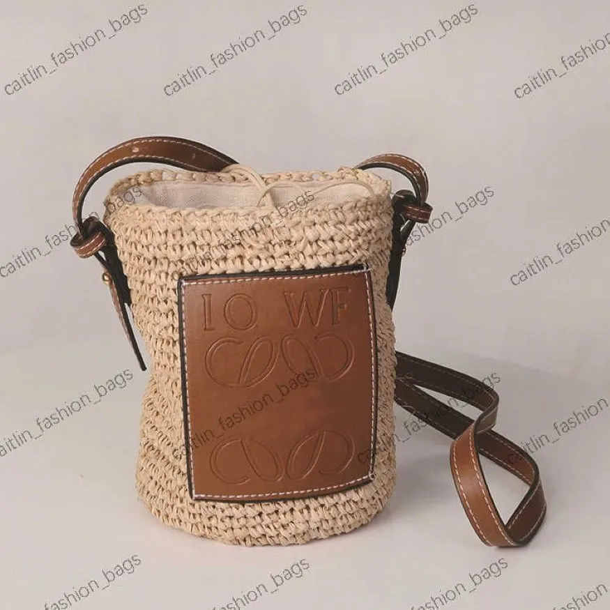 Borsa da donna di marca famosa Borsa di paglia scavata Borsa di paglia di moda Borsa di carta tessuta Borsa da spiaggia estiva Borsa a secchiello G230223283S