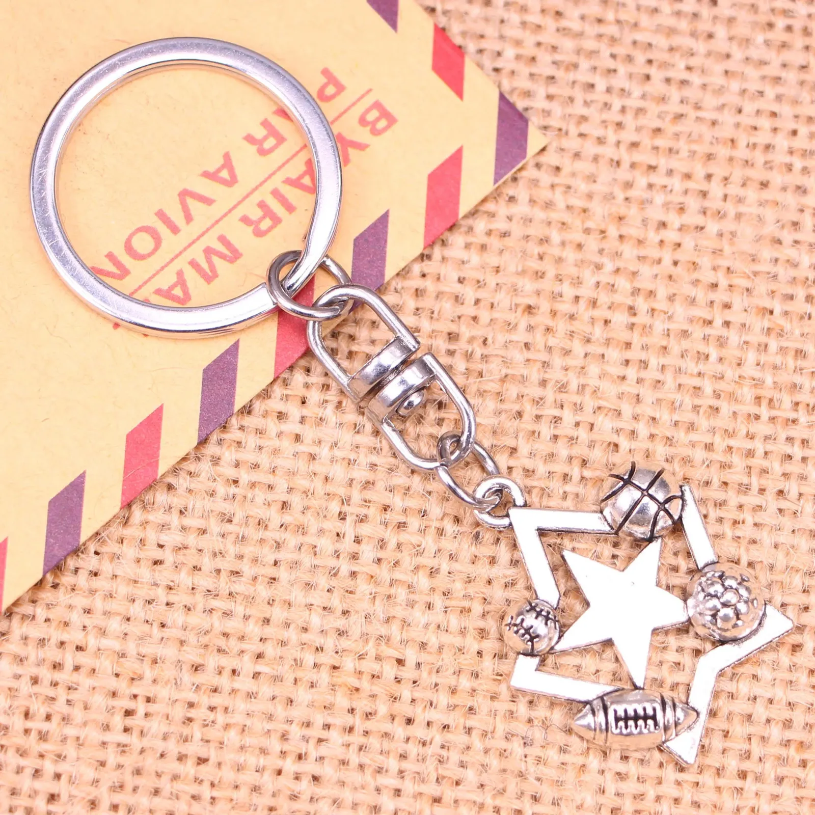 20st Fashion KeyChain 30*25 mm Star Football Soccer Football Baseball Hängen Diy Men smycken bilnyckelkedja för gåva 240221