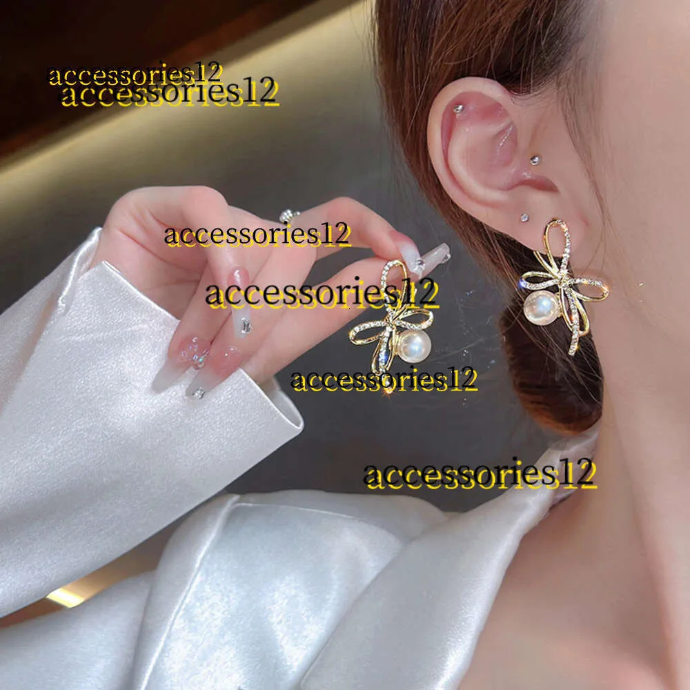 Dangle Chandelier Ear Stud Women Crystal Bow Pearl أقراط Korea Pretty Pearl 14k أصفر الذهب الأقراط