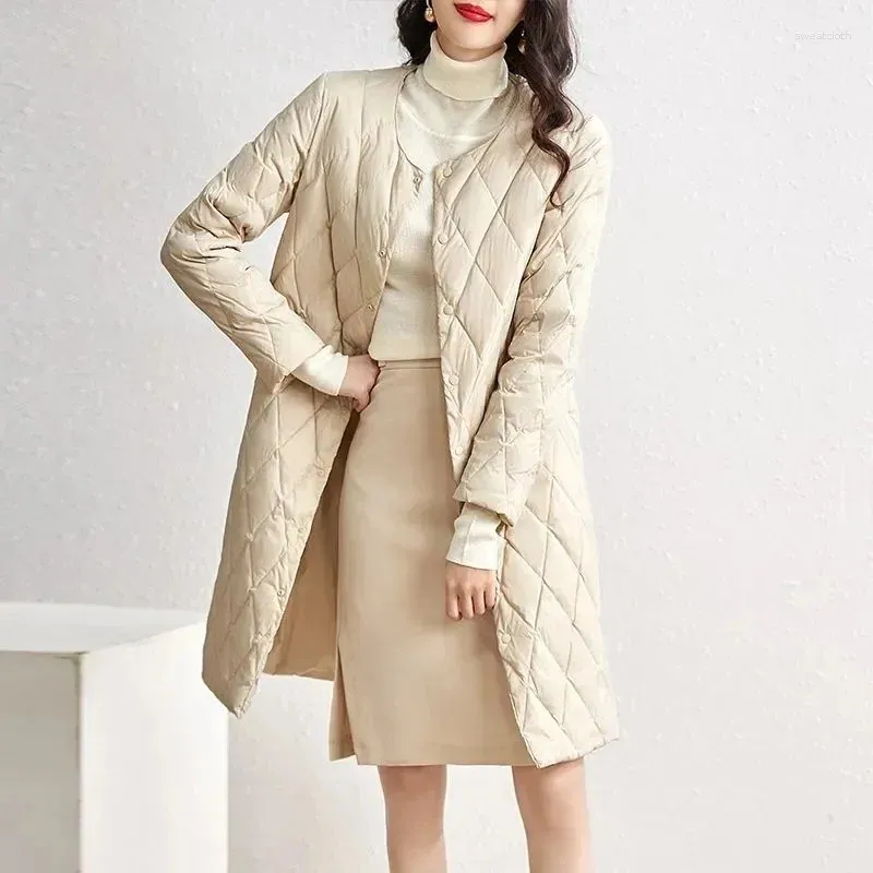Kvinnors dike rockar vinterkoreansk mode bomullsrock rund hals långärmad inner foder medellängd lättvikt och smal klänning kvinnor