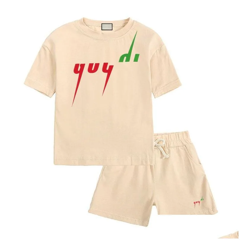 Set di abbigliamento Articoli spot Set di abbigliamento per bambini Ragazzi Ragazze Tute Suit Lettere Stampa 2 pezzi Designer T Shirt Pantaloni corti Abiti Clren Cas Dh1Og