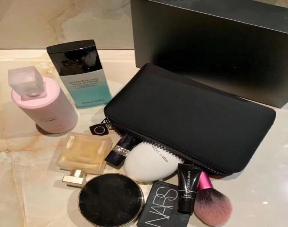 Paris marca saco de cosméticos com caixa de presente portátil saco de armazenamento de cosméticos luxo feminino designer zero bolsa elegante preto mini zip pock1241457