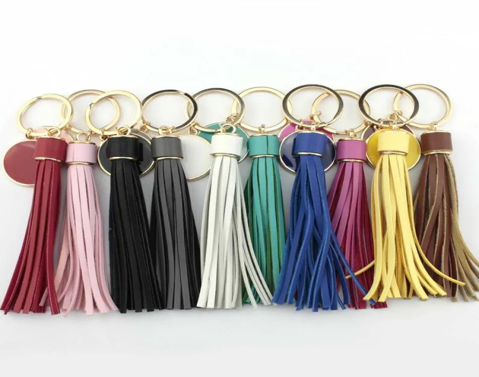 Unika personliga monograms -blanker Emaljskivläder Tassel Keychain Inledande graverade runda lädernyckelkedjor för väskbil Ke6102878