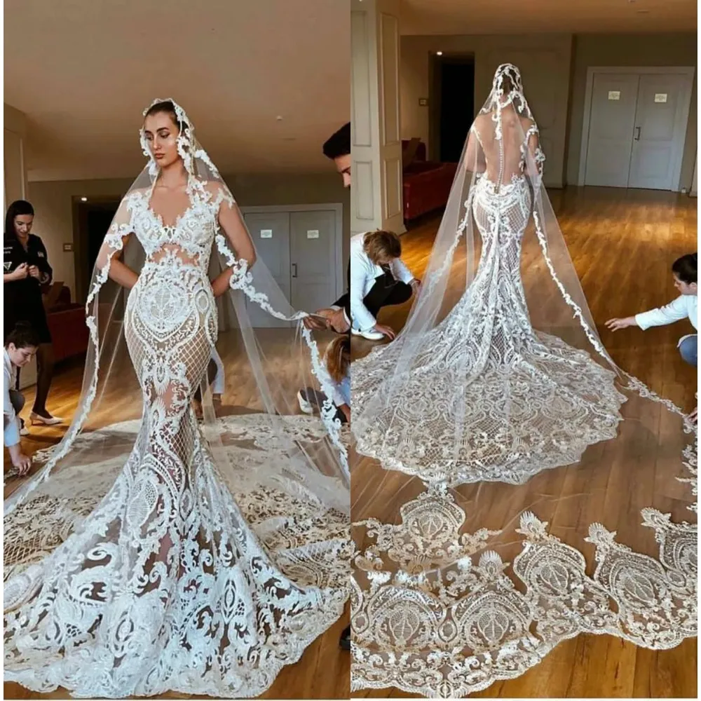 Stunningbride 2024 Splendidi abiti da sposa a sirena senza maniche con scollo a V in pizzo Abiti da sposa con bottoni ricoperti sul retro Plus Size Abito da sposa arabo saudita Dubai