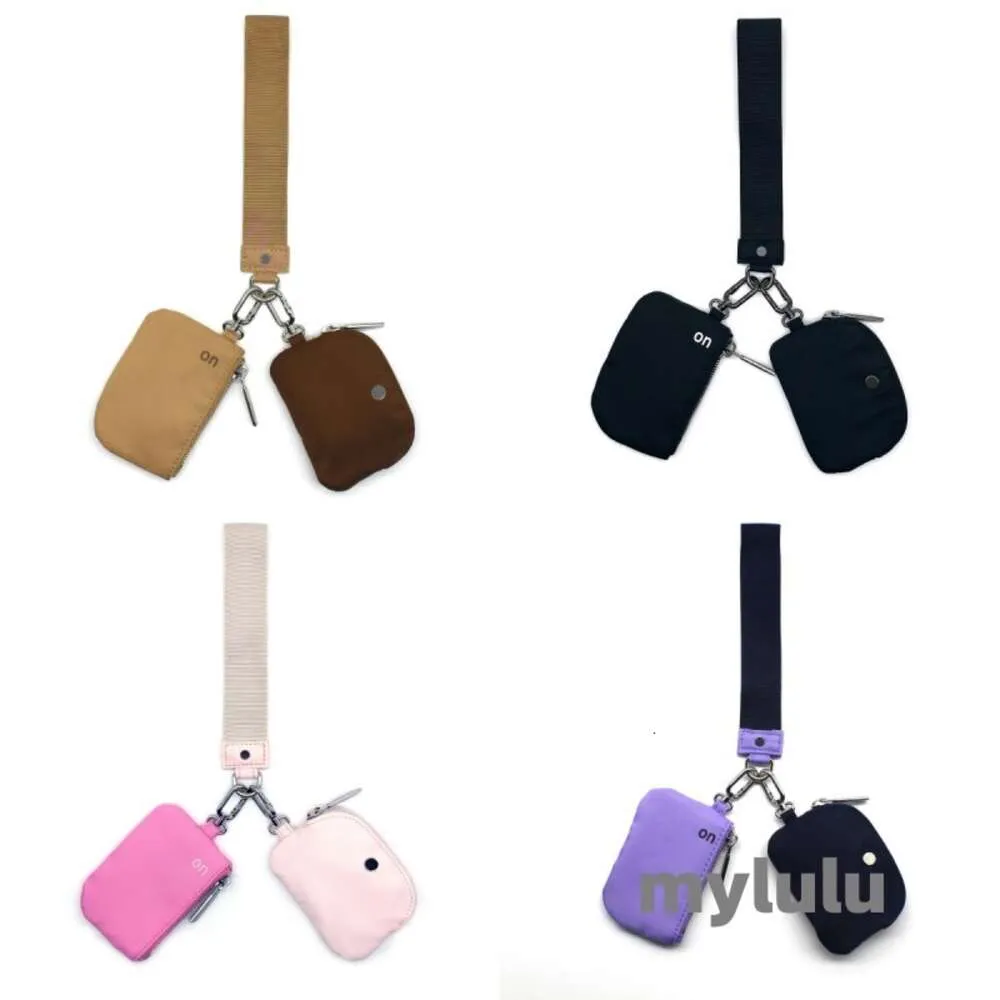 Yoga poignet Pink Keychain Mini Yoga Sac détachable Mini zipper enveloppe autour du portefeuille portefeuille portable portefeuille portefeuille portefeuille Mini sac de poche rose