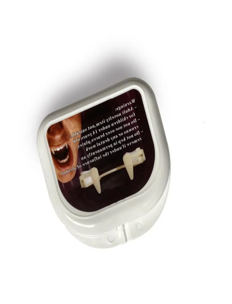 Set denti in oro hip hop retrattili Vampire Fangs0123458957699