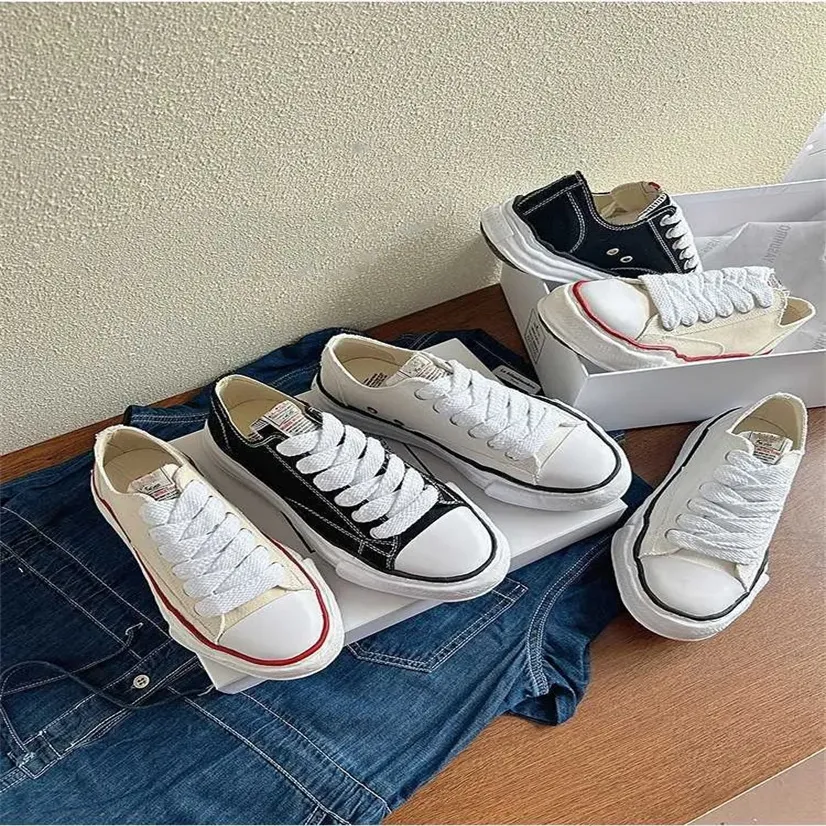 Casual schoenen ontwerper laag uitgesneden heren en dames veelzijdige opgeloste zomer zwart-wit canvas sneakers