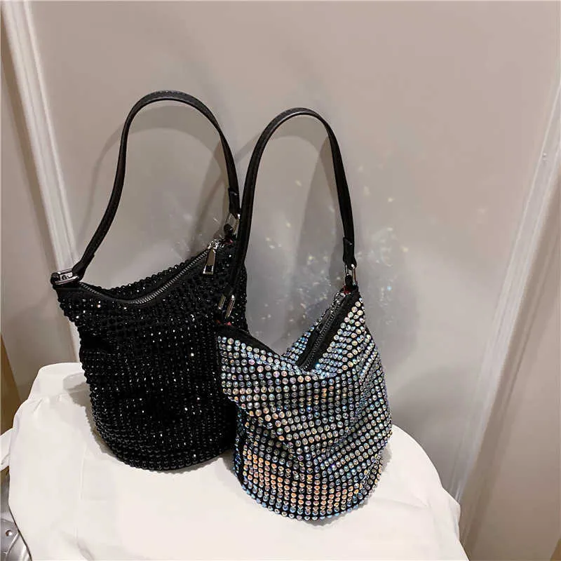 Sacs à bandoulière Nouveau populaire sac pour femmes Version coréenne à la mode Portable strass Style étranger polyvalent pleine perceuse main grande capacité seau 240427