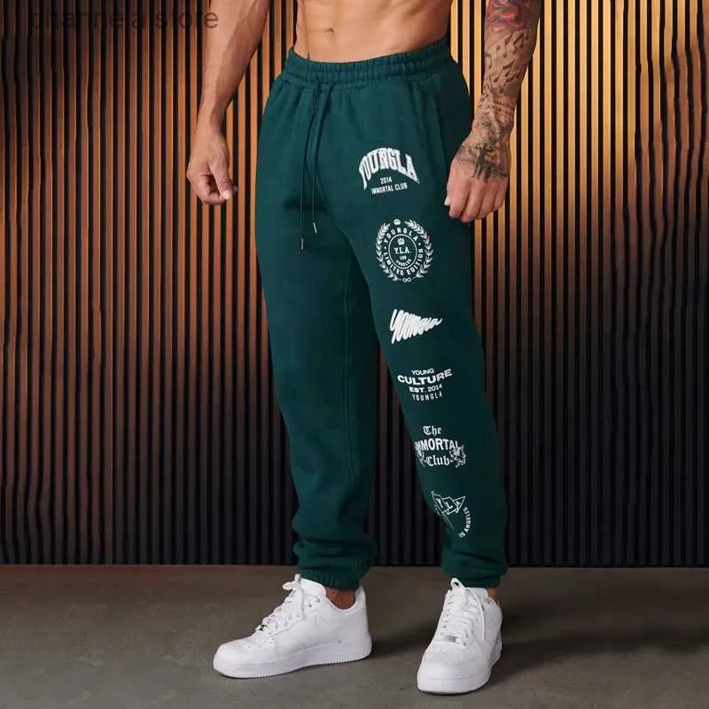 Pantalons pour hommes Jogger Hommes Pantalons de survêtement Style américain Vêtements pour hommes Gym Sports Fitness Coton Pantalons décontractés Imprimé Taille moyenne Pantalon à cordon T240227