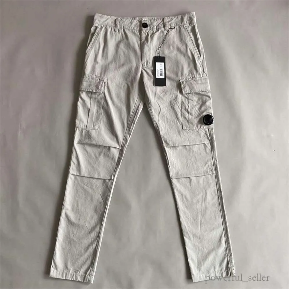 Cp Companys Pants Le plus récent vêtement teint Cp Companys pantalon cargo un pantalon de poche à lentille en plein air Cp Compagny hommes pantalon tactique survêtement 6665