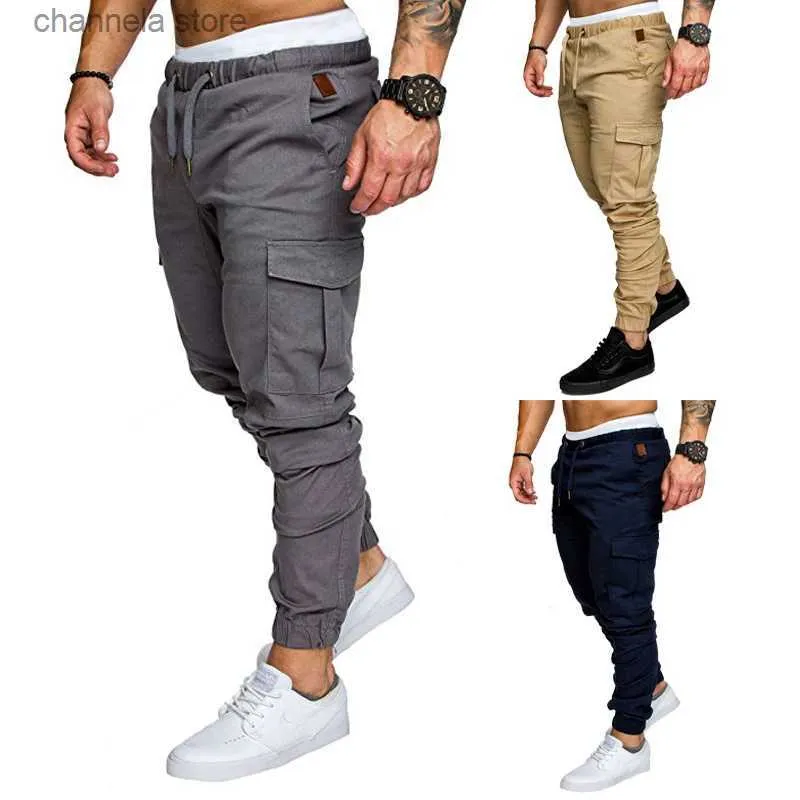 Calças masculinas Homens Safari Cargo Calças Corredores Sweatpants Casual Masculino Sportswear Sólido Multi-bolso Carga Calças Hip Hop Harem Pants Slim Fit T240227