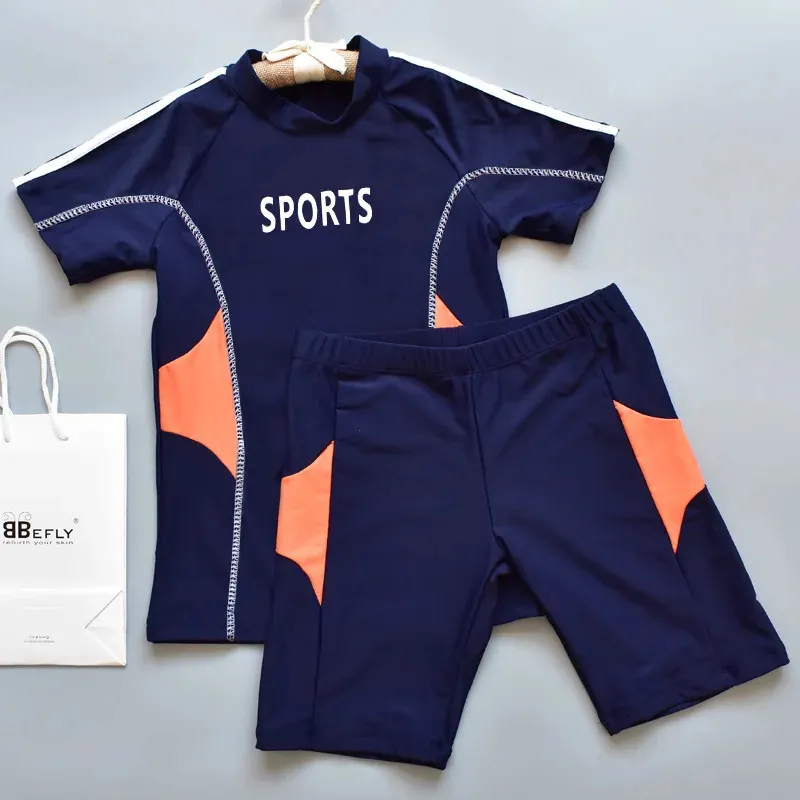 Children Boy Swimsuit Cartoon Dinozaur 2 sztuki garnitury pływackie Kostrowca na plażę kostium Bodysuit Childys Boys Szybkość kąpielowa Lasten Uimapuku 240226