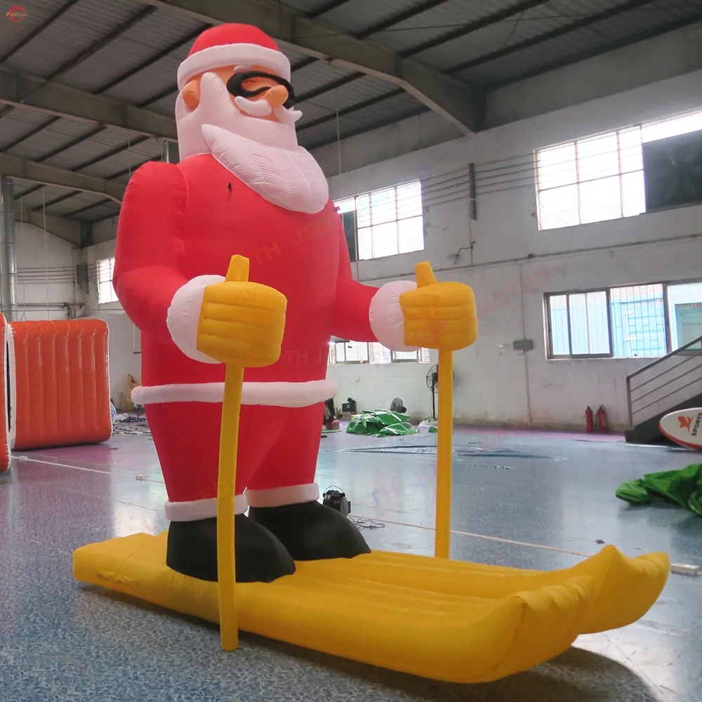 Gratis schip Outdoor Activiteiten 10mh (33ft) met ventilator Giant opblaasbaar Skiing Santa Claus Karakter opblaasbare kerstman voor kerstdecoratie