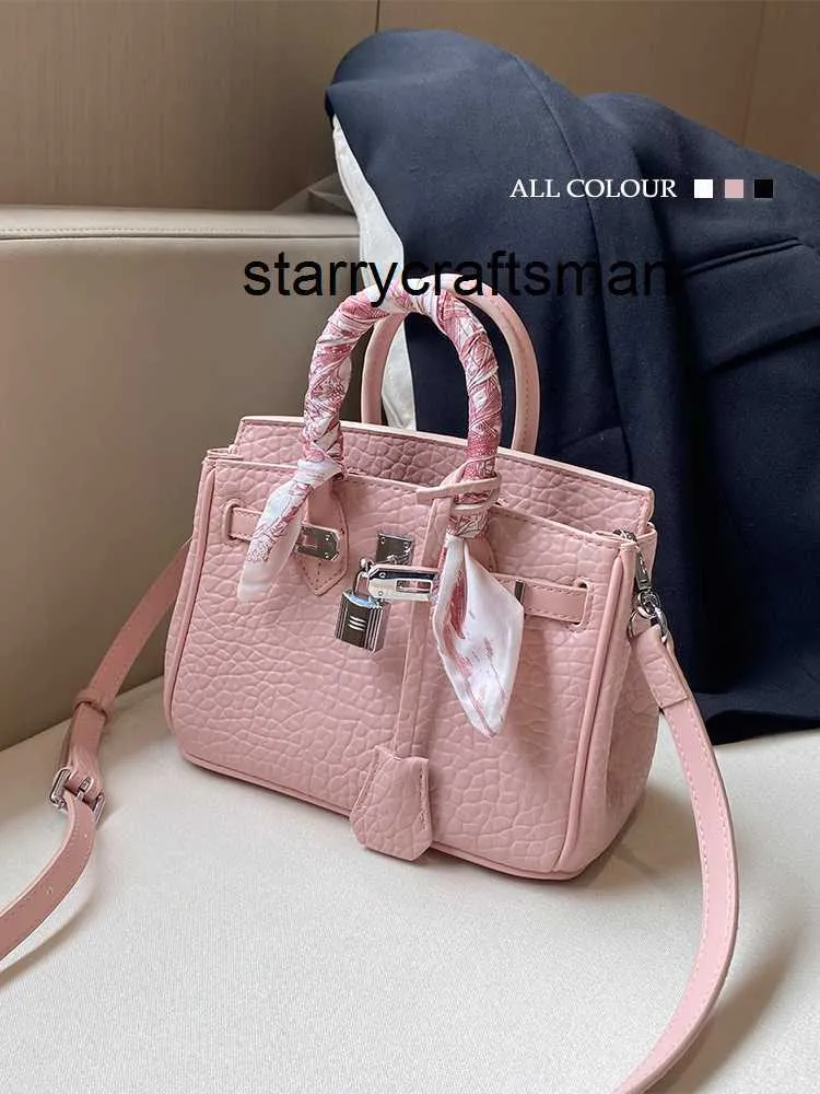 Bolsa de couro genuíno l grande capacidade commuter rosa bolsa portátil para as mulheres 2024 novo popular um ombro crossbody