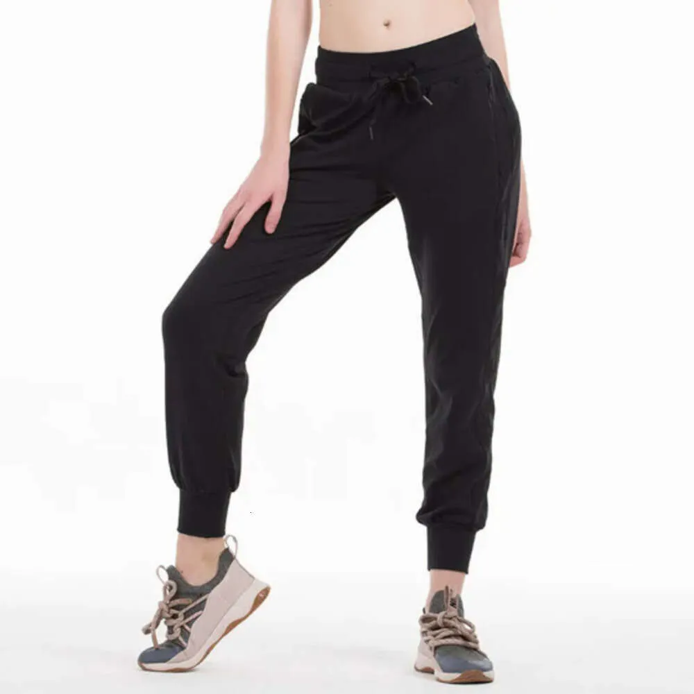 2024 lululemenI Naked Feel Tissu Yoga Entraînement Sport Pantalon de jogging Femme Taille Cordon Fiess Pantalon de survêtement avec deux poches latérales Style 888ggg