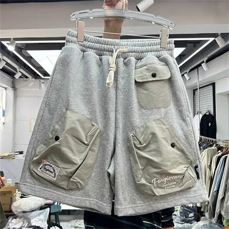 Shorts pour hommes Shorts multi-poches hommes femmes haute qualité tissu lourd shorts panneau culottes J240228