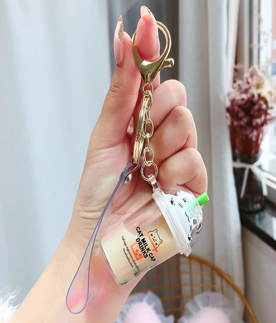 Keychains Cartoon Cute Cat Car Keychain Creative Milk Tea Cup Liquid Crystal Quicksand Sequin Key Ring Bag Pendant 20208941721