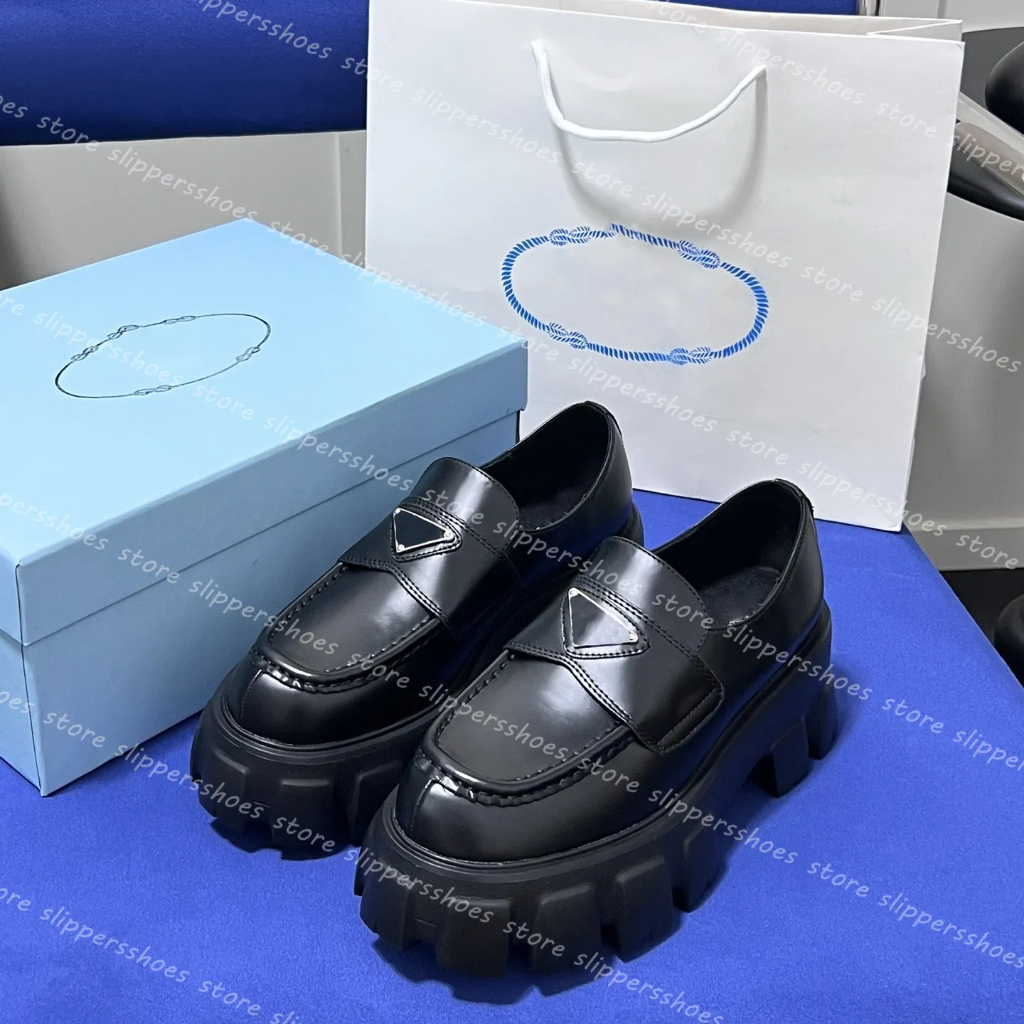 Designerskie buty mężczyźni kobiety swobodne platforma monolith Trójkąt logo czarne skórzane buty Zwiększ platformę trampki Cloudbust klasyczne patent mokasyny trenerzy 002
