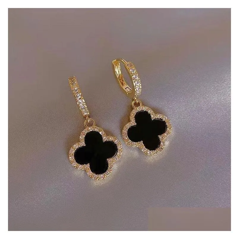 Boucles d'oreilles de créateurs Trèfle à quatre feuilles pour femmes senior classique petit vent parfumé or 18 carats lumière luxe flash hommes livraison directe J Dhdpt