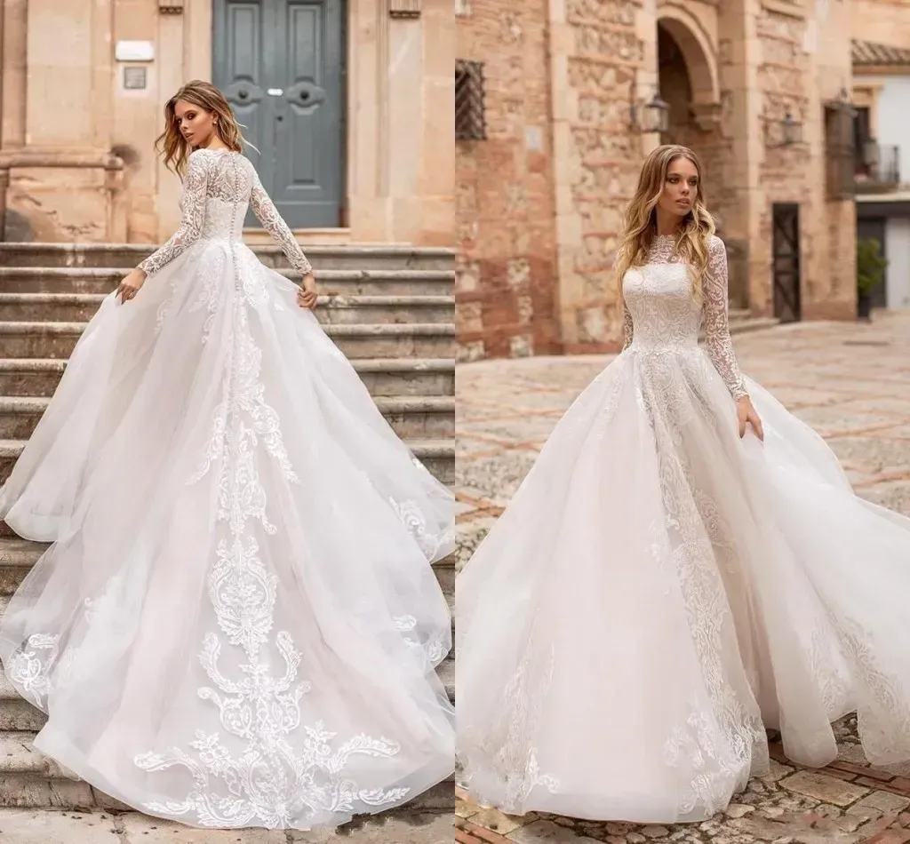 Elegant A-Line Tulle Bridal Gown with Lace Appliques Sheer Long SleevesCourt Train Button Details Bridal Gowns BC11287