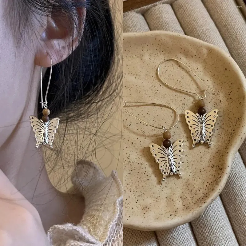 Orecchini pendenti cinesi fatti a mano vintage in metallo con farfalla e perline di legno, eleganti e squisiti, lunghi per le donne, accessori femminili in stile etnico