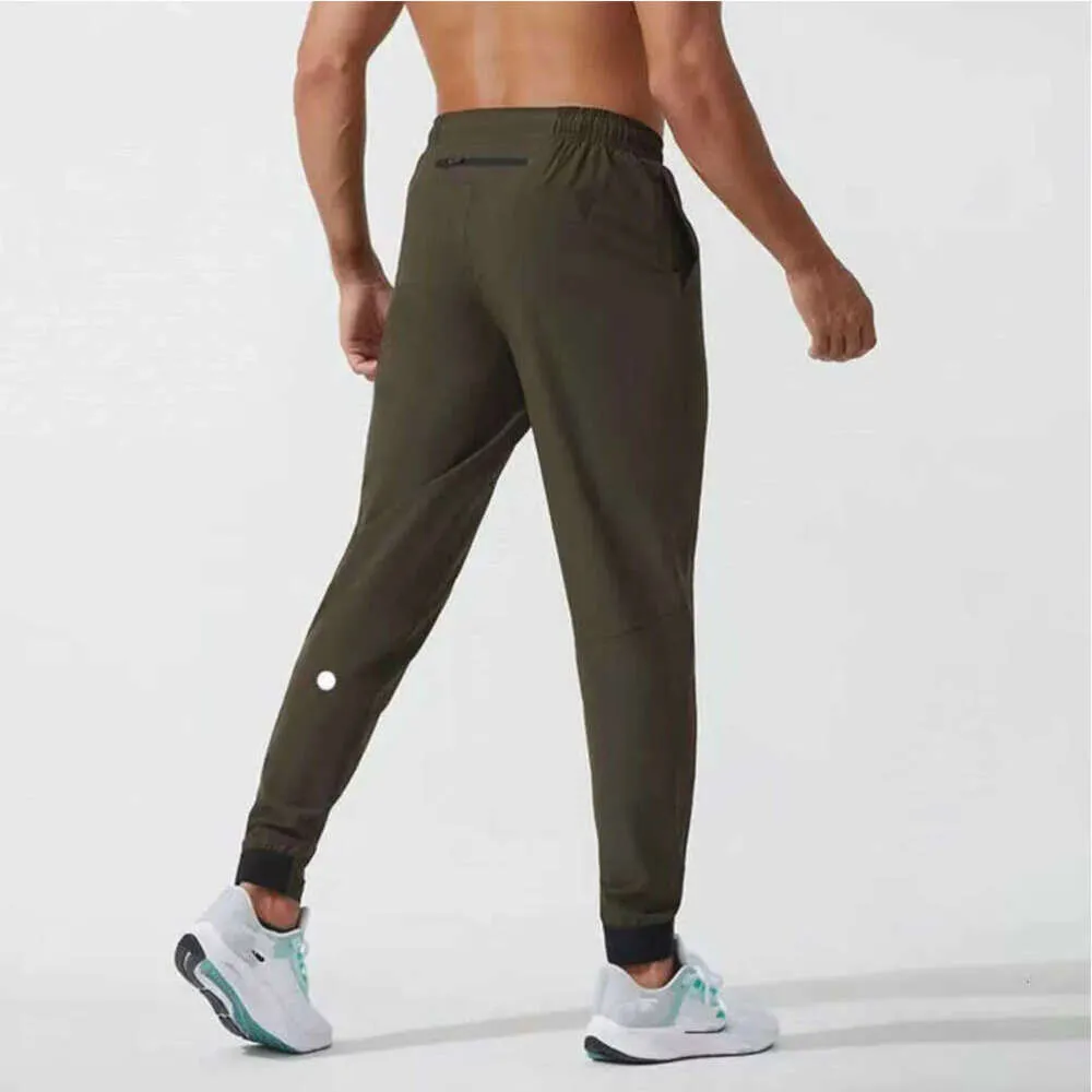 2024 lululemeni homem calças curtas yoga outfit jogger esporte secagem rápida cordão ginásio bolsos sweatpants calças masculinas casual cintura elástica fiess all-match 668ttt