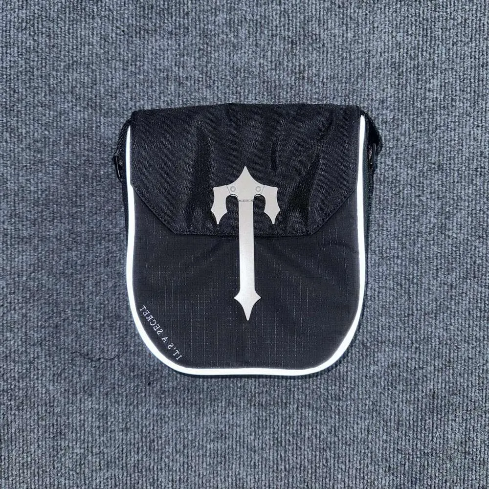 DHgate.com:New Trapstar Bag Reflective Edge Metal Button DHgate.com:New Trapstar Bag Reflective Edge Metal Button