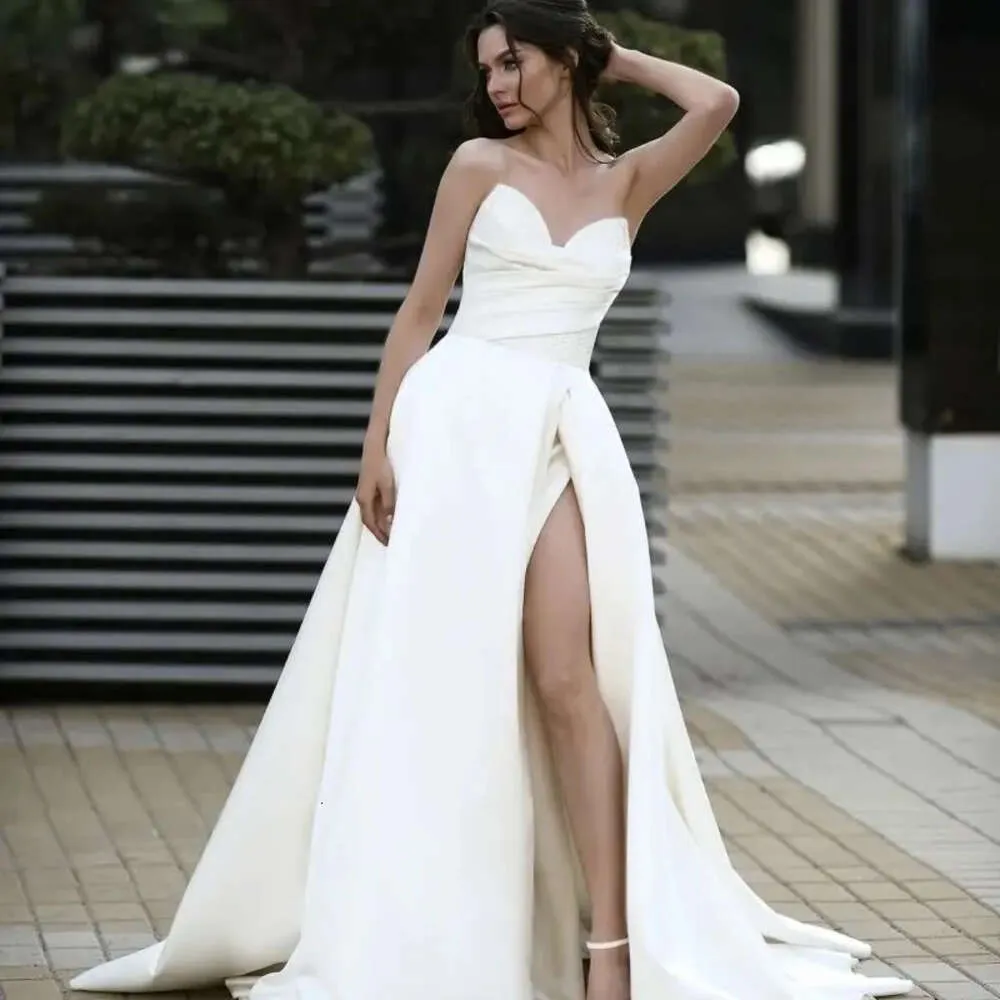 sachin and babi light blue dress Simple & Unique Modern Wedding Dresses main image 0