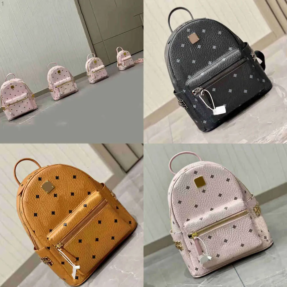 DHgate.com:MCMC Womens Rivet Leather Backpack: Luxury All