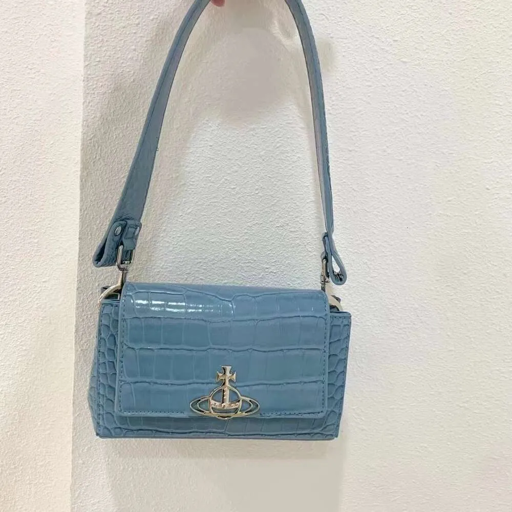 vivienne westwood水色 クロコダイルハンドバッグ Vivienne Westwood Women's' Crocodile Doll Mini Bag in Brown | LN-CC®