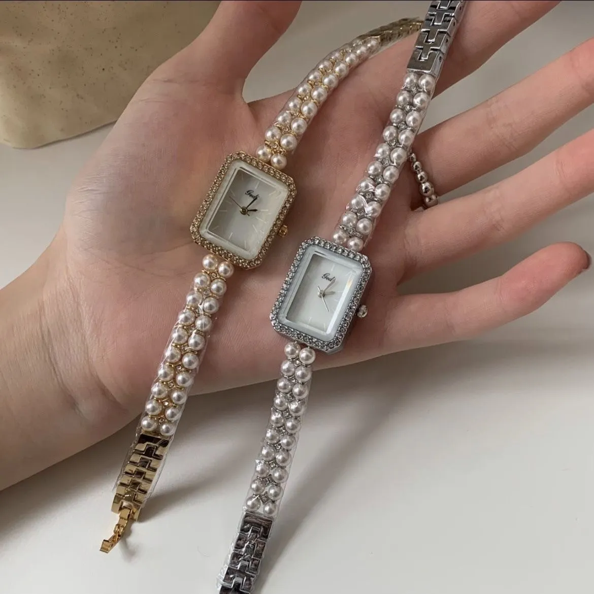 DHgate Fashionable Pearl Band Watch Timeless Luxury for Women Watches