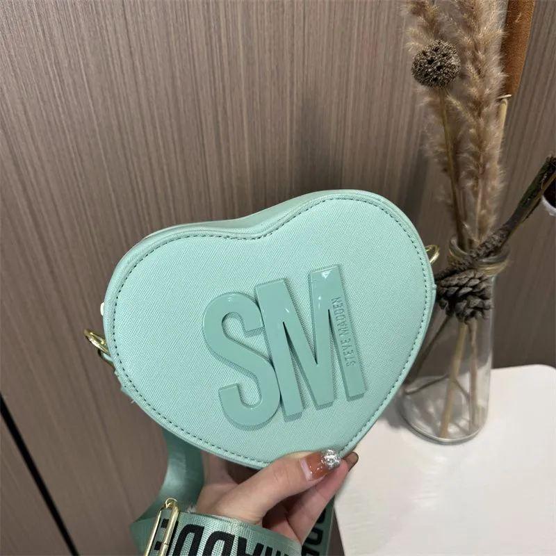 ◆THE MUSEUM VISITOR◆ HEART STUD MINI BAG SILVER 10360 DHgate.com:2024Womens Mini Heart Crossbody Bag - Stylish