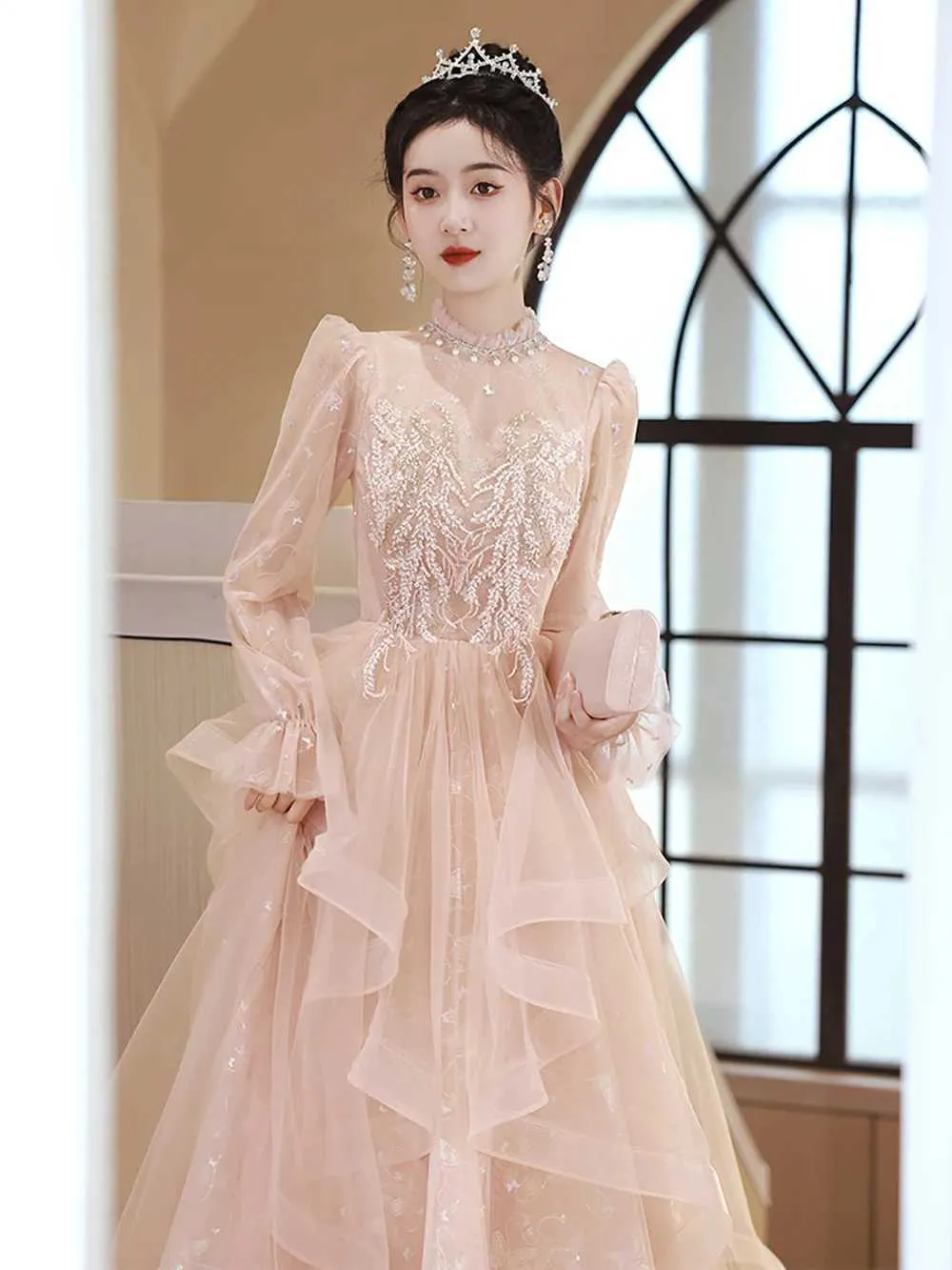 dresses runway luxury Pure elegance glides down the runway in this exquisite Ricca Sposa wedding gown. The off-the-shoulder neckline, intricate lace details, and dramatic ribbon-tie sleeves create a breathtakingly romantic and unforgettable bridal look