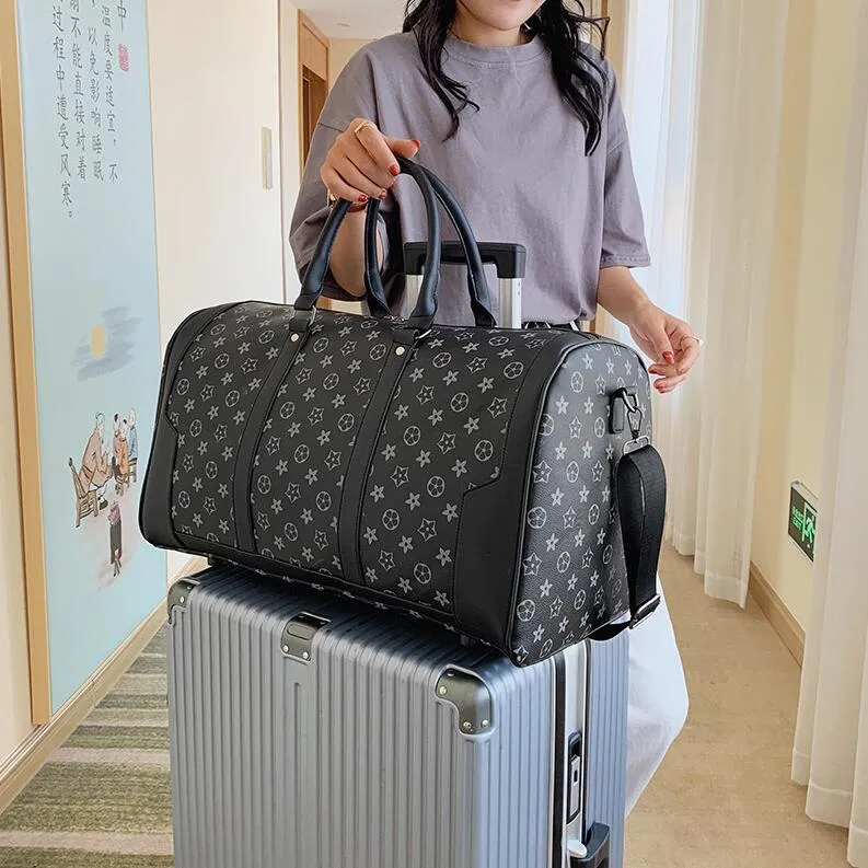 Designer luggage bag discount
